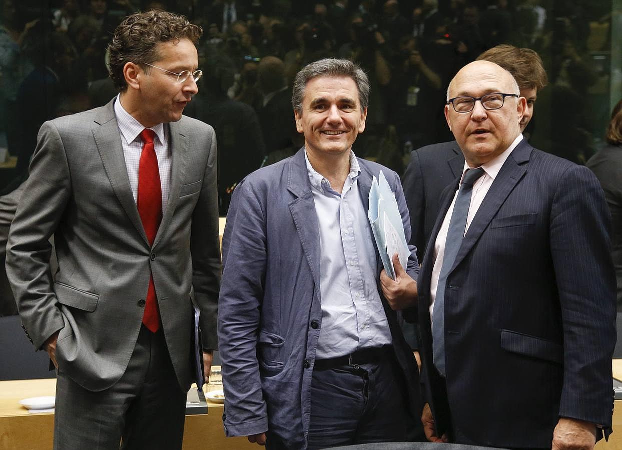 El presidente del Eurogrupo, Jeroen Dijsselbloem junto al nuevo ministro griego de Finanzas, Euclides Tsakalotos y el responsable galo de Finanzas, Michel Sapin